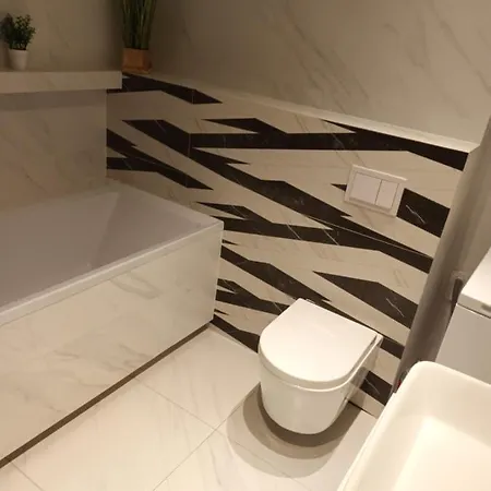 Uroczy Apartament *